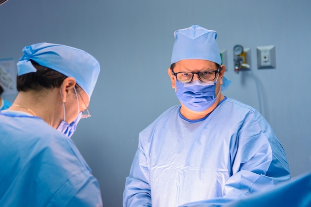 Group of surgeons in operating room