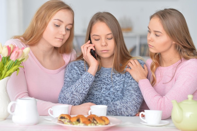 Group of teenage girls with smartphone