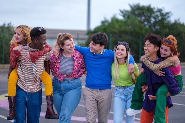 Group of teenagers in brightly colored clothes having a fun time