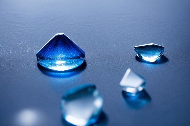 A Group Of Three Blue Diamonds Sitting On Top Of A Table