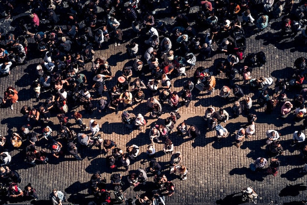 Photo group of tourists at old tow square. prague