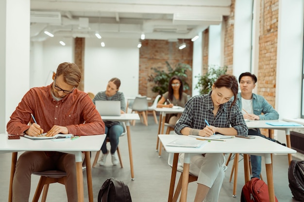 Group of university students taking a test