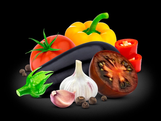 Group of vegetables, Eggplant, tomato, pepper and garlic on black.