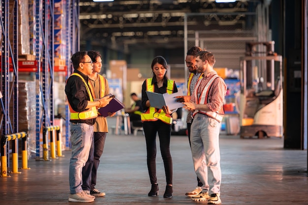 Photo a group of warehouse employees inspecting products on warehouse shelves