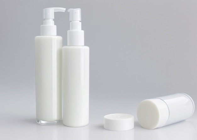 A group of white bottles cosmetics soap cream