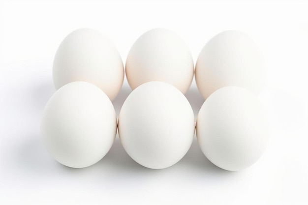 Foto un gruppo di uova bianche che sono impilate insieme