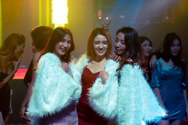 Premium Photo Group Of Women Friend Having Fun At Party In Dancing Club