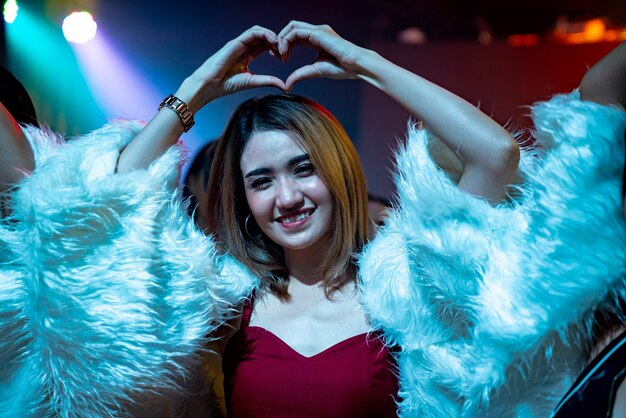 Group of women friend having fun at party in dancing club