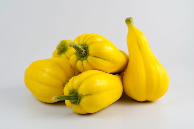 A group of yellow squashes