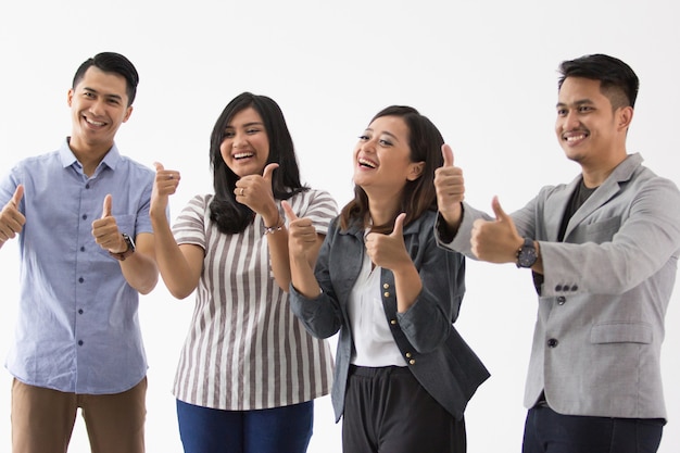 Group of young business people thumb up