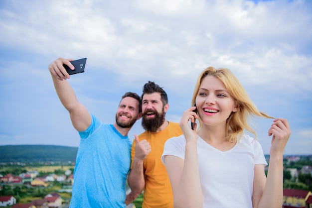 A group of young good looking friends do selfie photo portrait