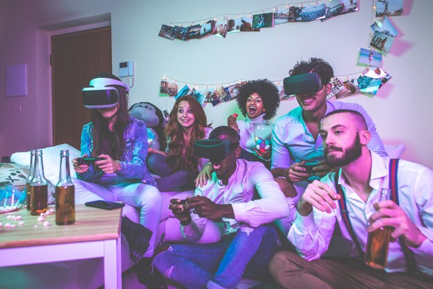 A group of young people celebrating and making party at home