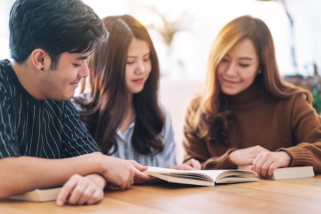 Group of young people enjoyed reading the same book together