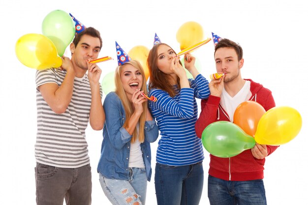 Group of young people having a birthday party