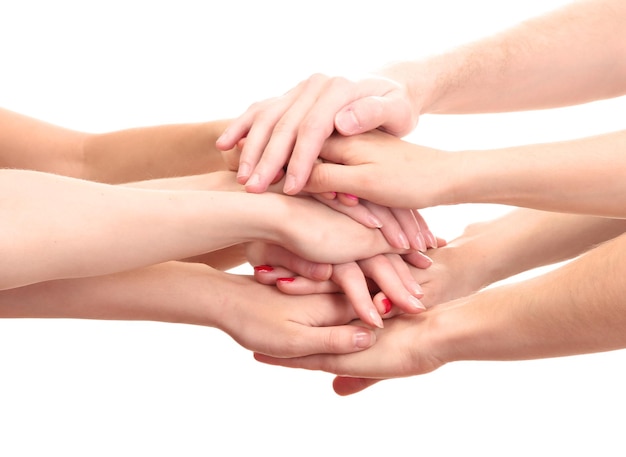 Group of young people's hands isolated on white