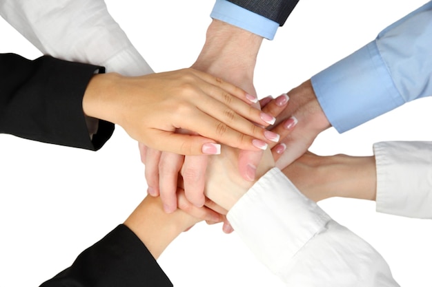 Group of young people's hands isolated on white