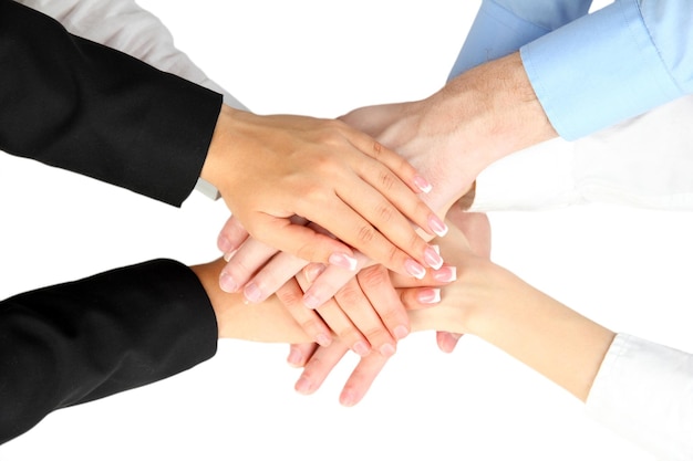 Group of young people's hands isolated on white