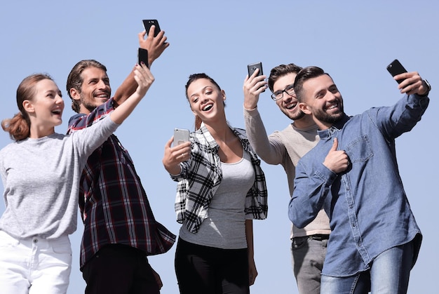 Group of young people taking a selfie