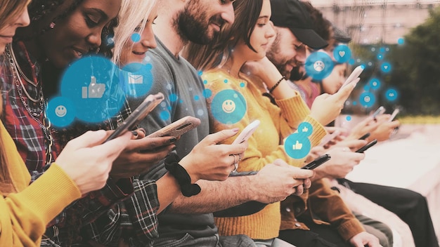 Group of young people using social network on smartphone  generation z person looking at smartphone