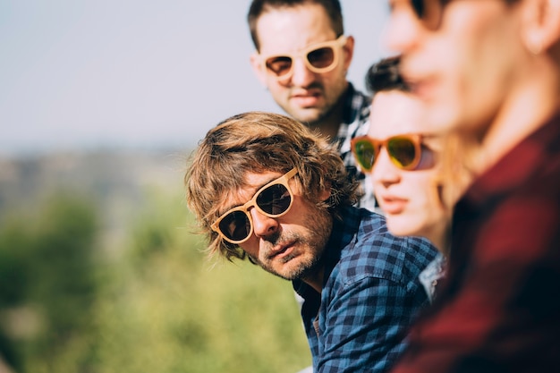 Group of young people wearing sunglasses