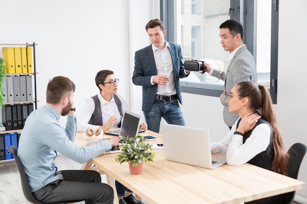 Group of young people working together