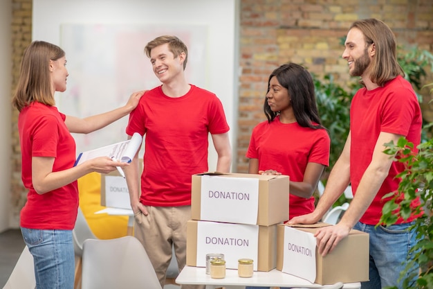 A group of young volunteers at work in a distribution point