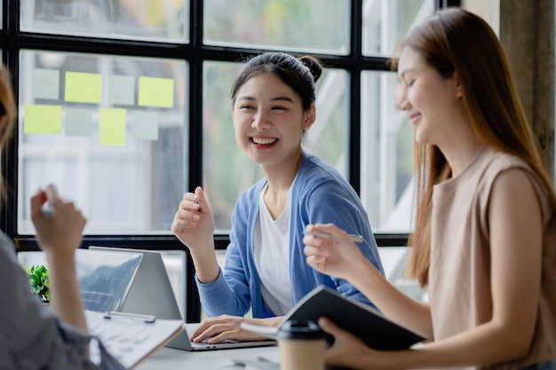 Groups of people gathered in the conference room they were having a brainstorming meeting and planning meetings to manage the company's growth and profit Management concept from the new generation