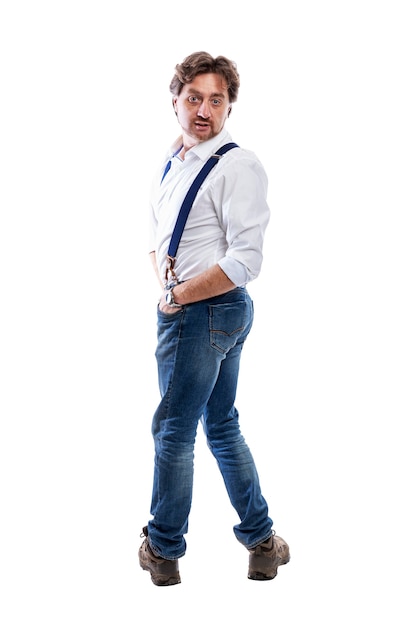 A grown man in jeans and a white shirt turned around. Full height. Isolated on white background. Vertical.