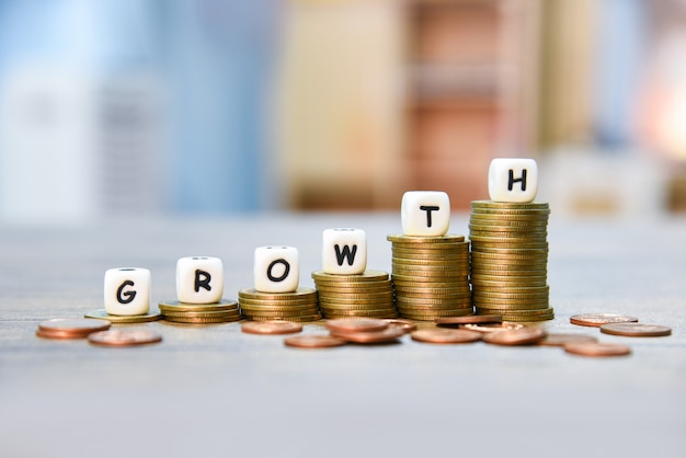 Photo growth concept stack of golden coins growth of infographics money graph up stairs business finance