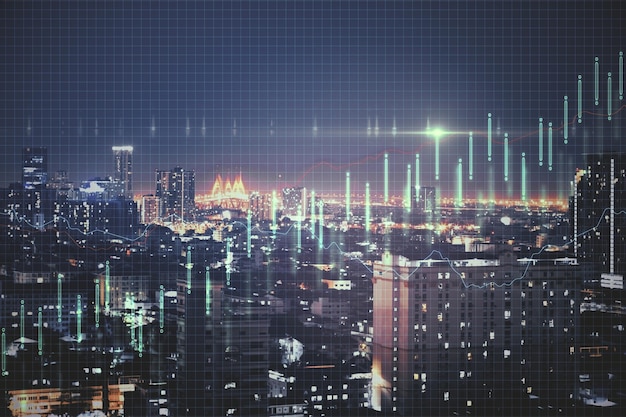 Growth concept with business chart at night megapolis city background