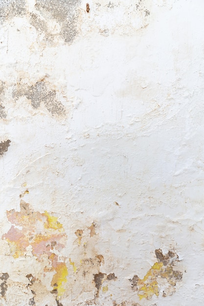 Grunge abstract background. Plaster and paint clog, structural damage, water damage on building wall