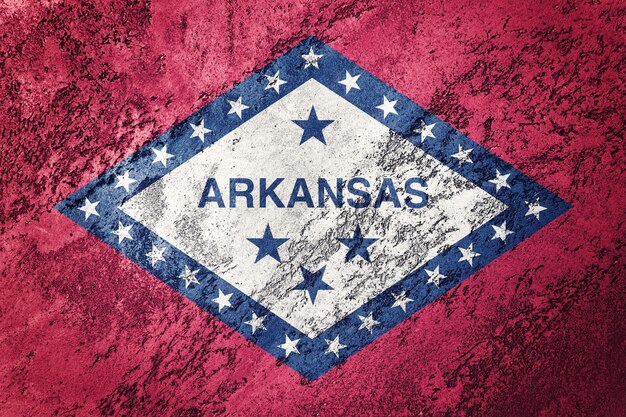 Grunge Arkansas state flag. Arkansas flag background grunge texture.