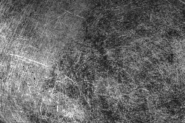 Grunge authentieke metalen structuur Krassen op getextureerd metaal Textuur krassen monochroom Ruwe getextureerde harde achtergrond Het oppervlak is beschadigd