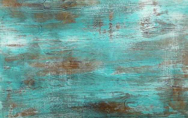 Grunge blue and white painted brushed and weathered uneven wooden surface background