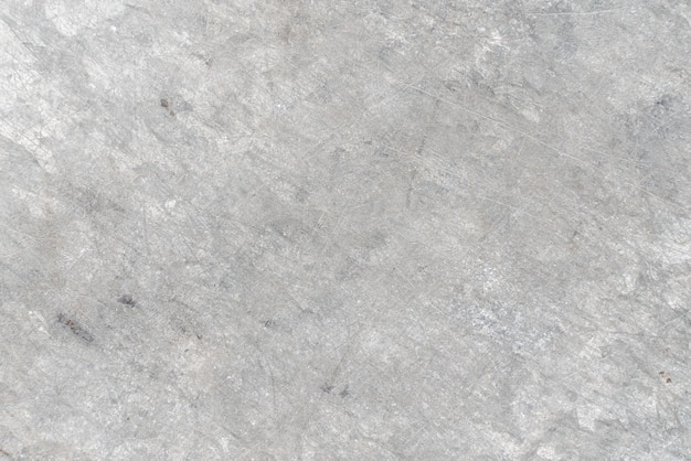 Photo grunge dirty grey cracked cement wall, concrete dirty paper, old parchment background. textured concrete background included free copy space for product or advertise wording design