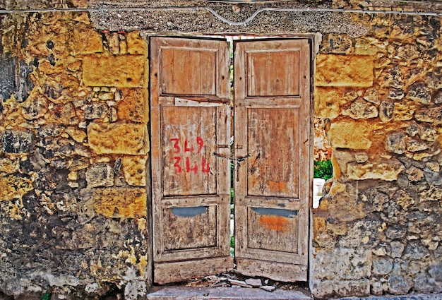 Grunge door in an Italian old town