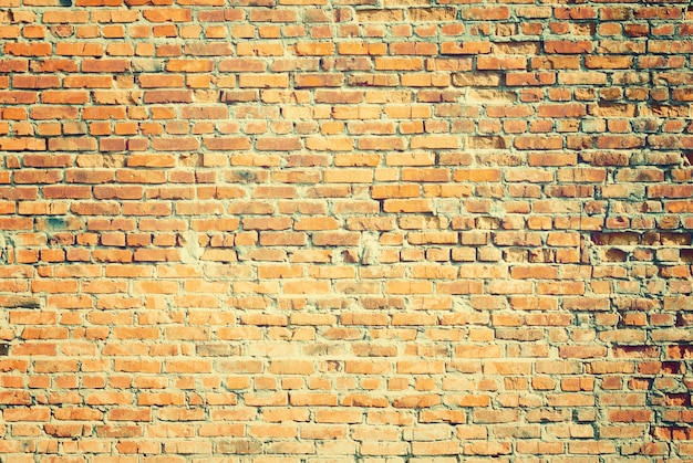 Grunge orange brick wall background texture