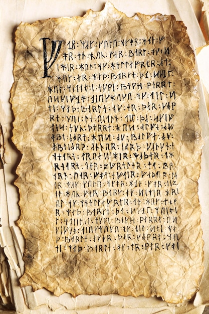 grunge papers with hieroglyphics close up
