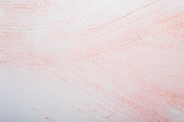 写真 grunge pink paint strokes on white paper abstract background