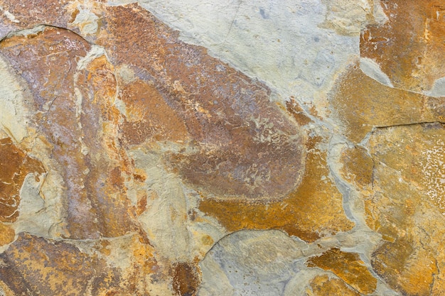 Grunge roestige oranje bruine metalen cortenstaal stenen achtergrond