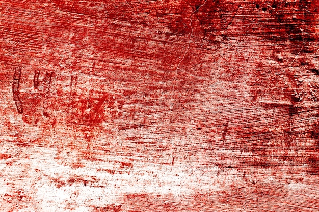 Foto grunge spaventoso cemento rosso vernice rossa sulla parete di cemento sangue rosso sulla vecchia parete per il concetto di halloween