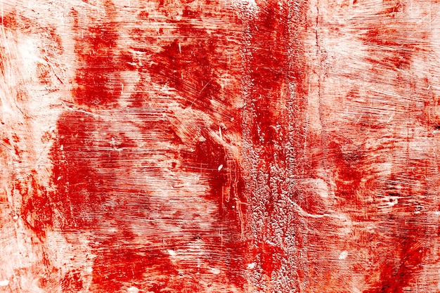 Grunge scary red concrete Red paint on concrete wall Red blood on old wall for halloween concept