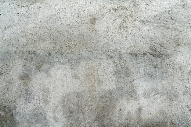 Grungy gray wall of an old house