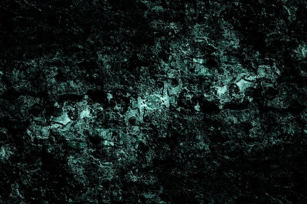 Grungy ruw grunge getextureerd donker muuroppervlak voor achtergrond