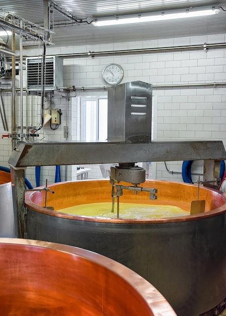 Gruyere de Comte Cheese Production in the dairy in Franche Comte, Burgundy, of France.