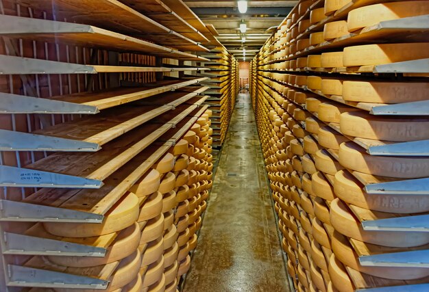 Gruyeres, Switzerland - January 2, 2015: Affinage cellar in the Maison du Gruyere in the medieval town of Gruyeres in the canton of Fribourg, Switzerland