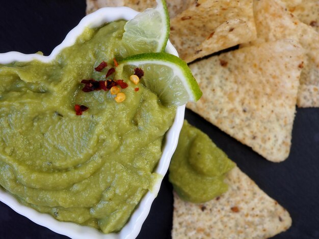 Guacamole sauce and corn chips