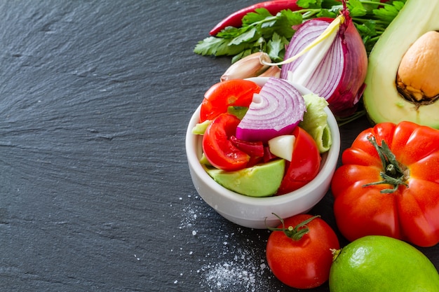 Guacamole sauce and ingredients