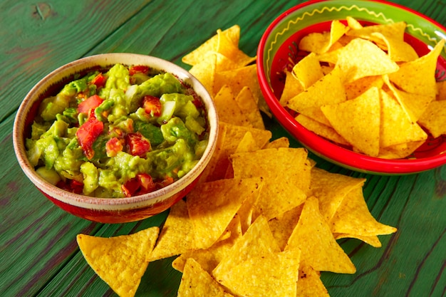 Guacamole with avocado tomatoes and nachos