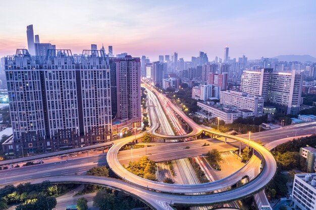 Guangzhou huangpu interchange in twilight with city skyline